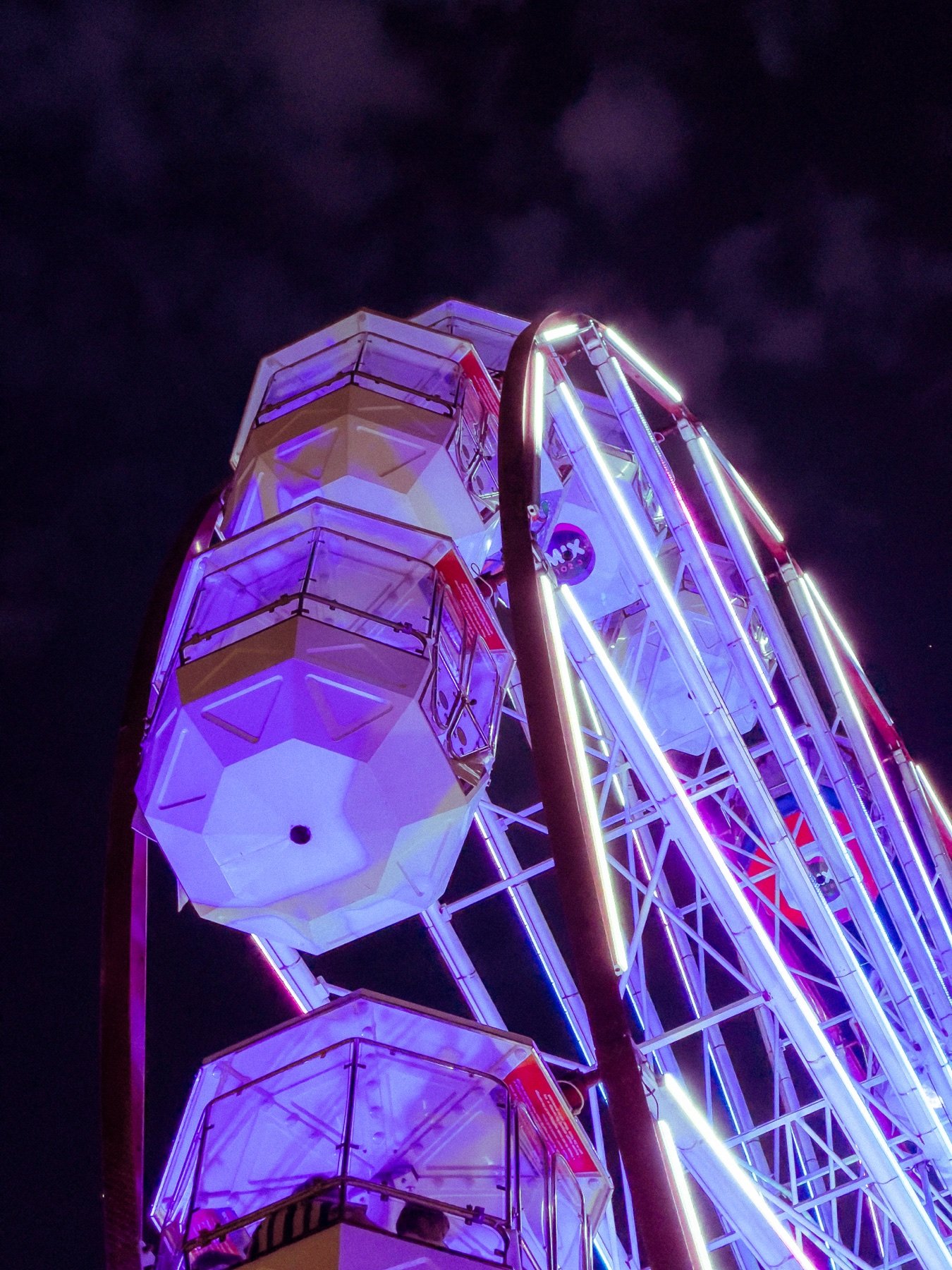 A night-lit ferris wheel